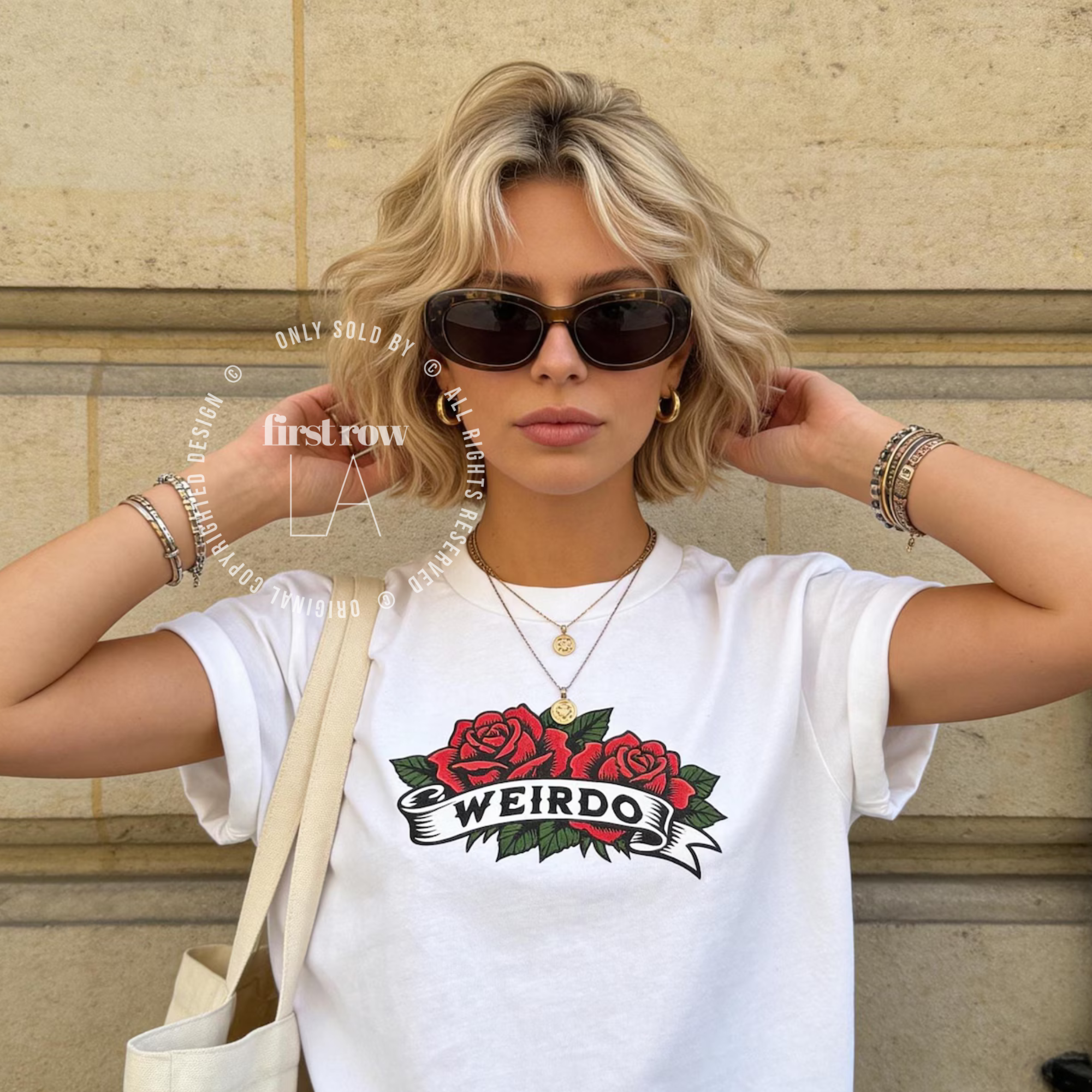 A woman wearing an oversized T-shirt with a red rose graphic and the word 'WEIRDO' 

Original design and copyright by first row LA.