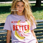 A woman wearing T-shirt with a yellow banana illustration and the text 'THE OLDER YOU GET the BETTER YOU GET UNLESS YOU ARE A banana'.

Original design and copyright by first row LA, August 4th 2026.