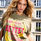 A woman wearing T-shirt with a yellow banana illustration and the text 'THE OLDER YOU GET the BETTER YOU GET UNLESS YOU ARE A banana'.

Original design and copyright by first row LA, August 4th 2026.