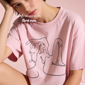 A model with a short blonde bob wears a pale yellow oversized t-shirt featuring a black continuous line art graphic of a woman and her martini.

Original design first row LA.
Copyright lilo on paper 2023.