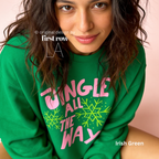 Woman wearing Jingle All The Way, Pink Christmas Sweatshirt, Bright Snowflakes, Colorful Holiday Sweater, Fun Christmas Shirt, Cute Holiday shirt.

Original design and copyright by first row LA 2026.
