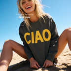 A woman wearing a grey crewneck sweatshirt with large yellow 'CIAO' print.

Original design and copyright by first row LA 2026