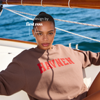 A woman wearing 'HAVNEN' varsity sweatshirt.

Original design and copyright by first row LA.