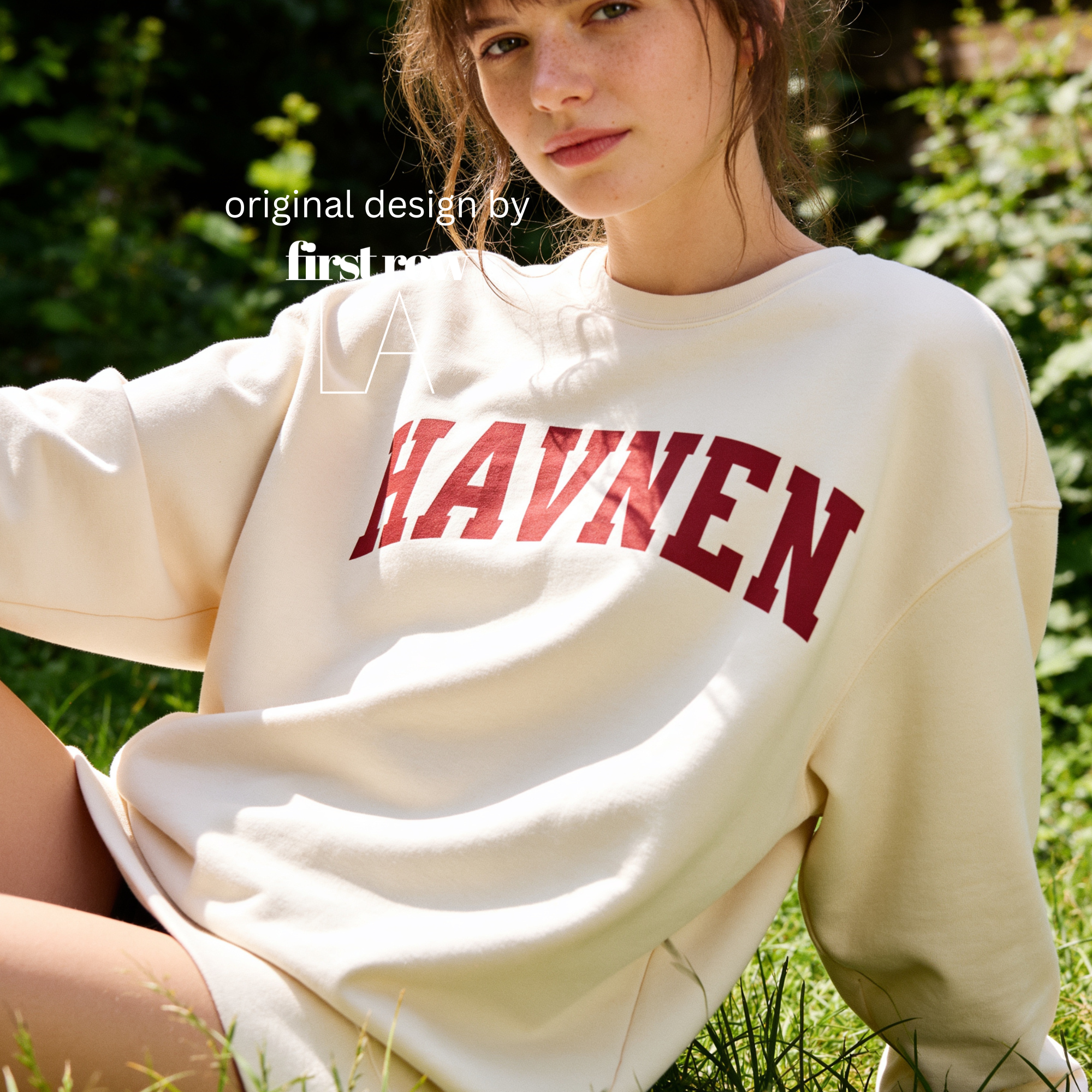 A woman wearing 'HAVNEN' varsity sweatshirt.

Original design and copyright by first row LA.