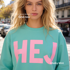 Woman wearing HEJ sweatshirt with pink print.

Original design and copyright © 2026 by First Row LA. All rights reserved. Unauthorized copying, reproduction, or use of this artwork or product photos is strictly prohibited.