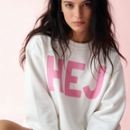 Woman wearing HEJ sweatshirt with pink print.

Original design and copyright © 2026 by First Row LA. All rights reserved. Unauthorized copying, reproduction, or use of this artwork or product photos is strictly prohibited.