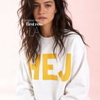 Woman wearing HEJ Sweatshirt with Yellow Handwritten font. Danish Hello Crewneck, Scandinavian Graphic Hygge Sweatshirt, Hyggelig Nordic Minimalist Pullover

Original design and copyright by first row LA 2026