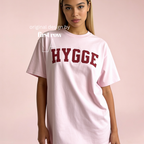 Woman wearing HYGGE T-shirt

Original design and copyright by first row LA 2025