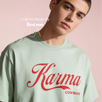 Man wearing t-shirt with a large red 'Karma' script and 'COWBOY' text 

Original design and copyright by first row LA.