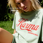 A woman wearing a bay graphic T-shirt with red 'Karma COWGIRL' lettering.

Original design and copyright by first row LA.