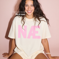 Woman wearing NÆ T-Shirt, Nah Shirt, Nope T-Shirt, Danish Slang Shirt, Scandinavian Humor Tee, Pink Text Shirt, Funny Danish Gift, Absolutely Not shirt, I don't think so

Original design and copyright by first row LA 2026.