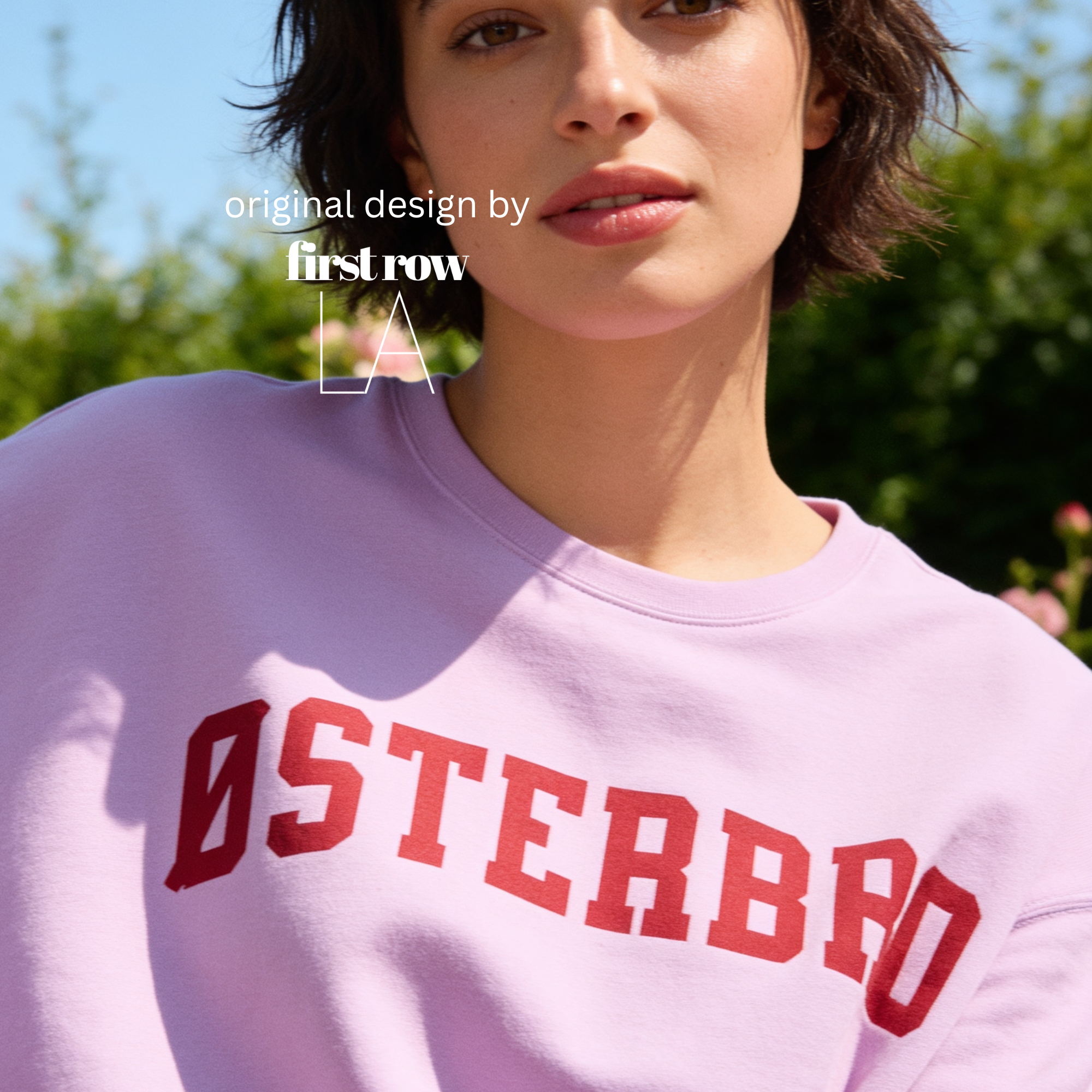 A woman wearing a crewneck sweatshirt with 'ØSTERBRO' printed in dark red across the chest.

Original design and copyright by first row LA.