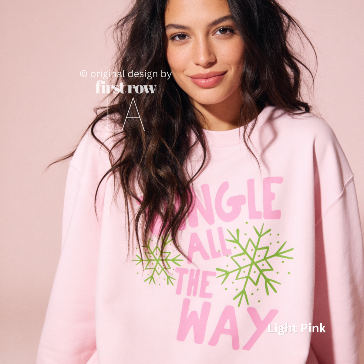 Woman wearing Jingle All The Way, Pink Christmas Sweatshirt, Bright Snowflakes, Colorful Holiday Sweater, Fun Christmas Shirt, Cute Holiday shirt.

Original design and copyright by first row LA 2026.