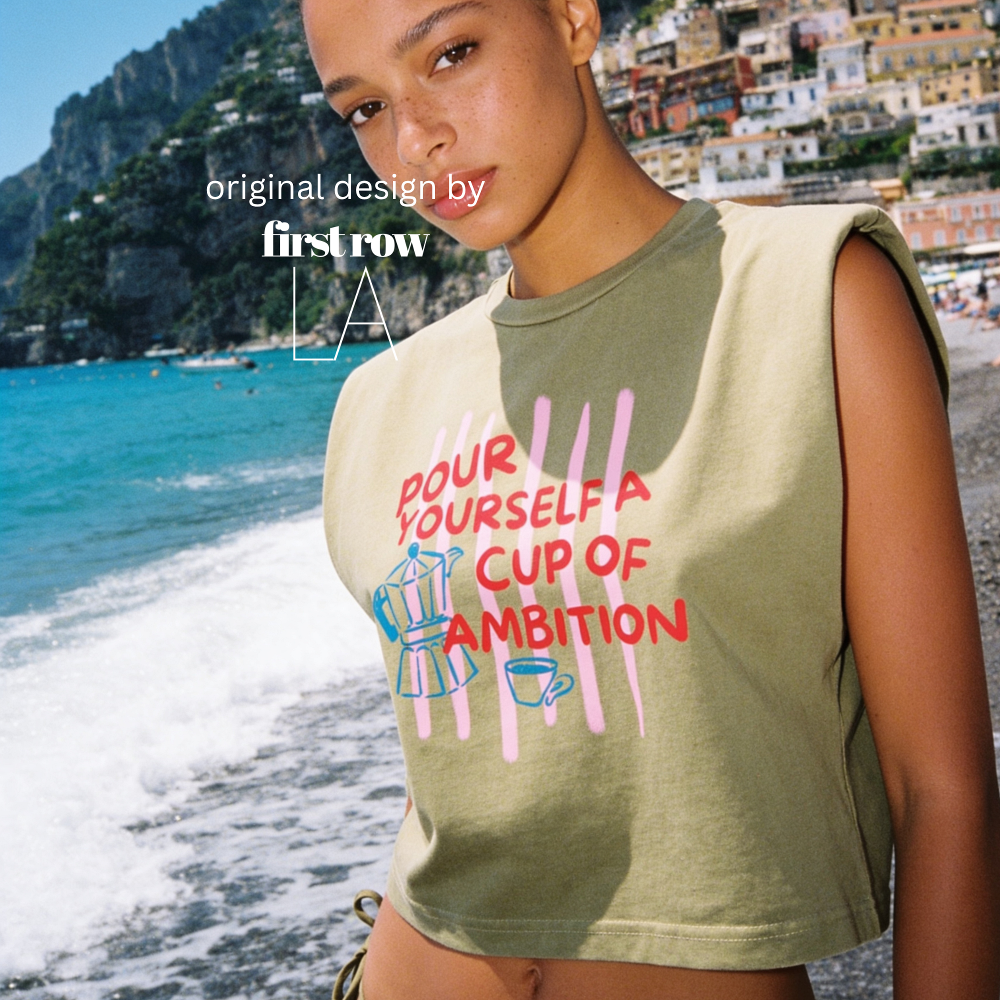 A woman wearing a sleeveless cream-colored t-shirt with a graphic print that reads 'POUR YOURSELF A CUP OF AMBITION' in red, decorated with pink vertical stripes, a blue moka pot, and a small coffee cup. 

Original design and copyright by first row LA.