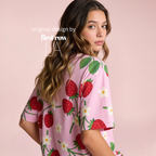 Woman wearing pink T-shirt with strawberries and flowers.

Original design and copyright by first row LA.