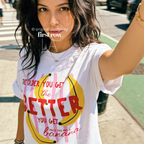 A woman wearing T-shirt with a yellow banana illustration and the text 'THE OLDER YOU GET the BETTER YOU GET UNLESS YOU ARE A banana'.

Original design and copyright by first row LA, August 4th 2026.