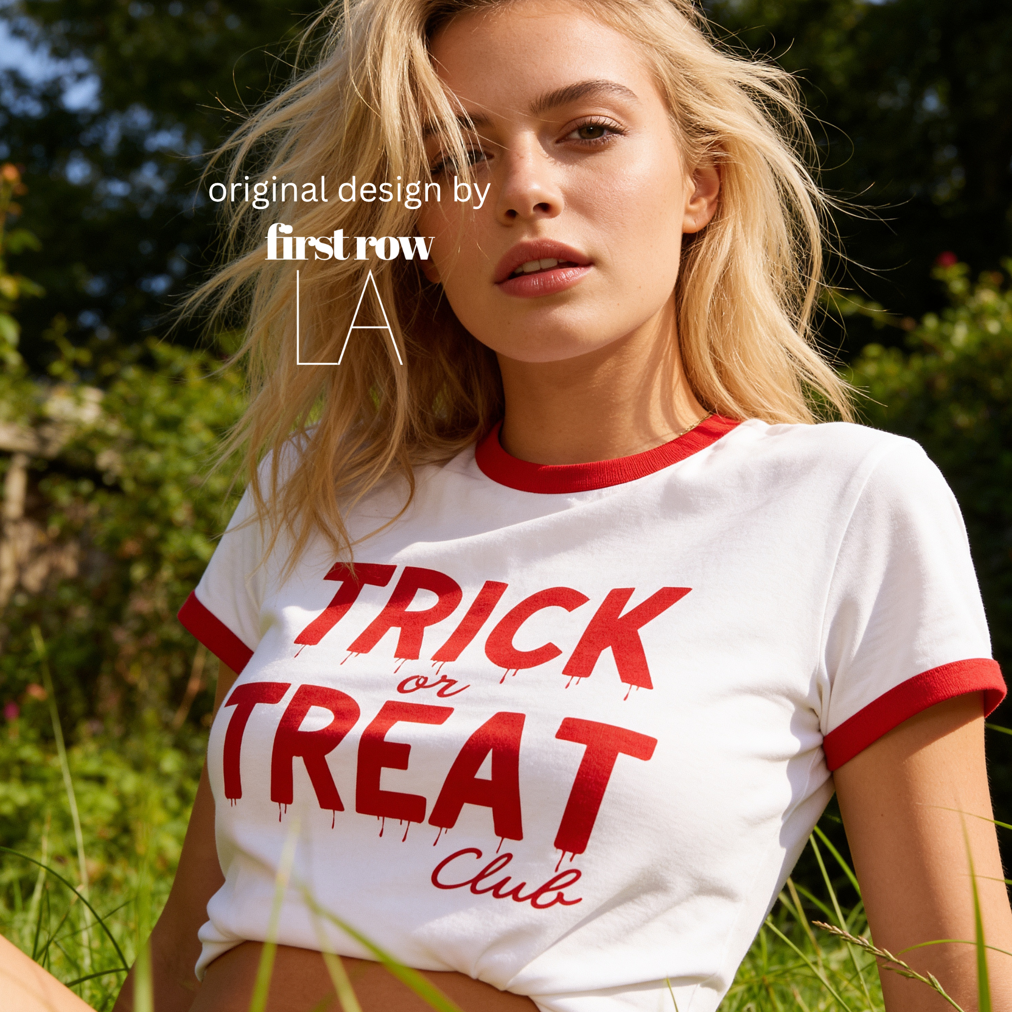 A woman wearing a white ringer T-shirt with red trim and a red graphic that reads 'TRICK or TREAT Club' in a dripping font.

Original design and copyright by first row LA.