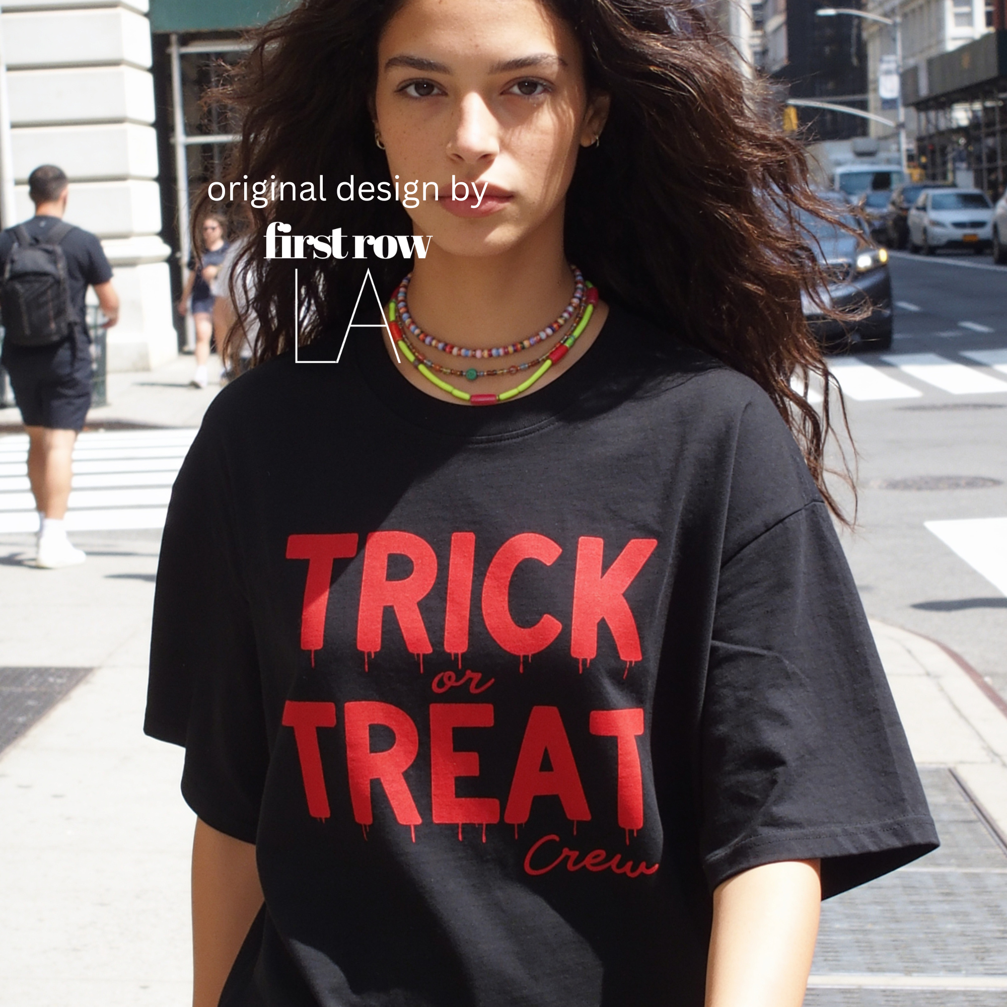 Woman wearing crewneck T-shirt with 'TRICK or TREAT Crew' printed in dark red across the front.

Original design and copyright by first row LA.
