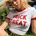 Woman wearing a white ringer crop top with red trim and 'TRICK or TREAT Crew' printed in red dripping text.

Original design and copyright by first row LA.