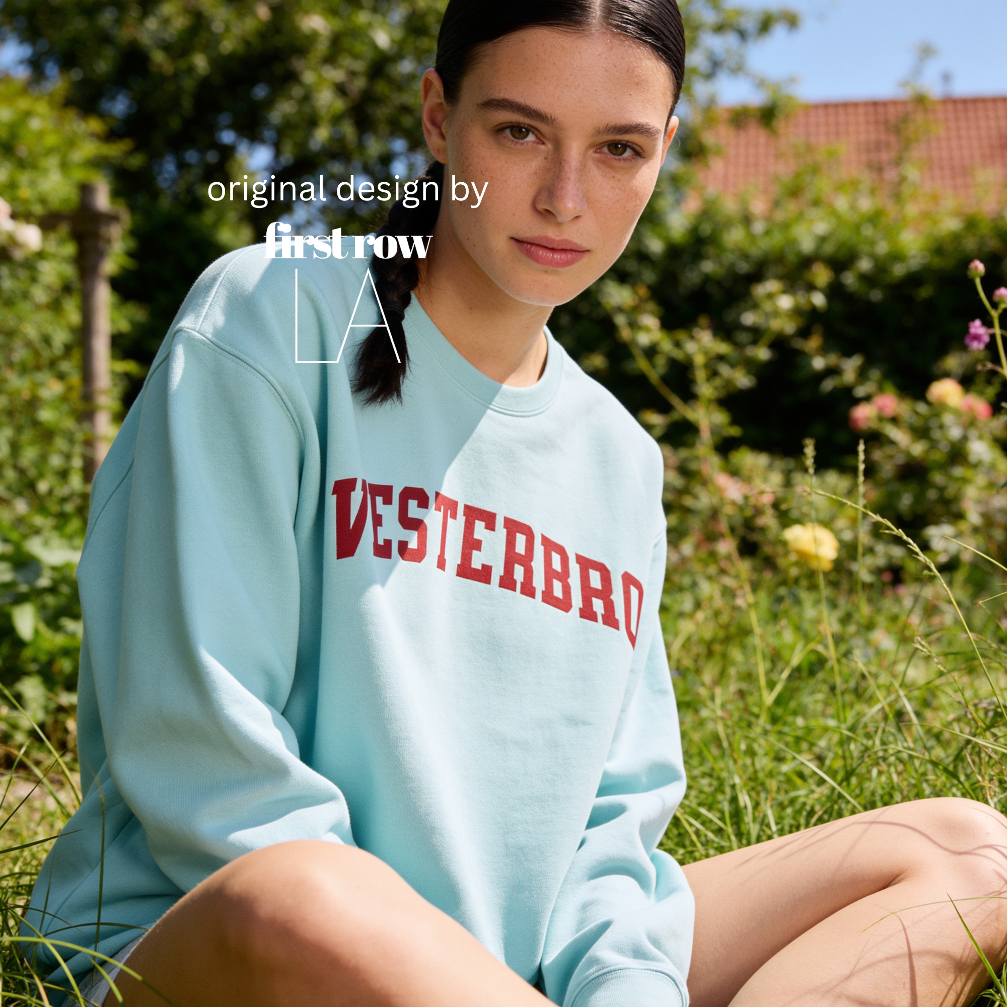 Woman wearing a crewneck sweatshirt with 'VESTERBRO' printed in dark red collegiate letters across the chest.

Original design and copyright by first row LA.