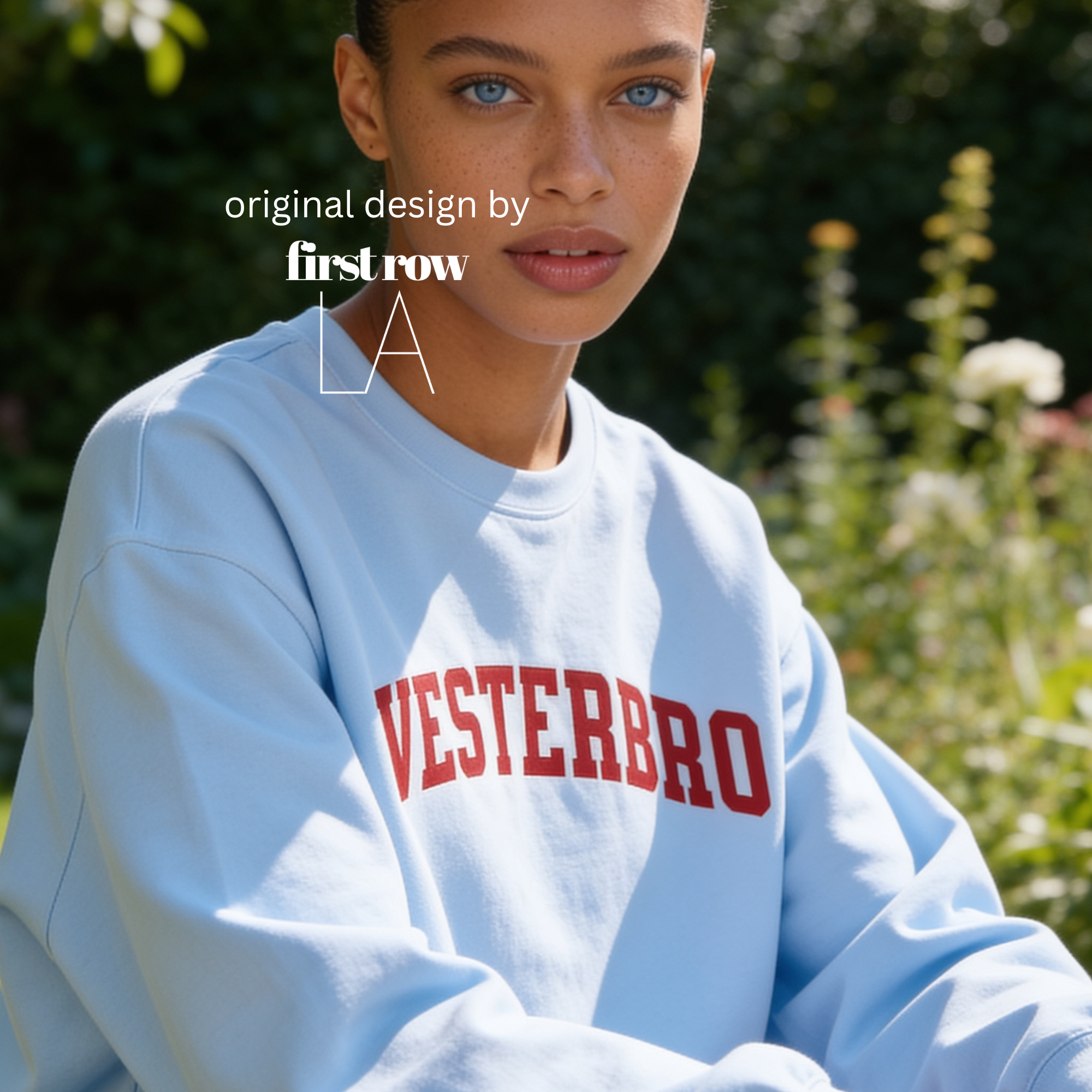Woman wearing a crewneck sweatshirt with 'VESTERBRO' printed in dark red collegiate letters across the chest.

Original design and copyright by first row LA.