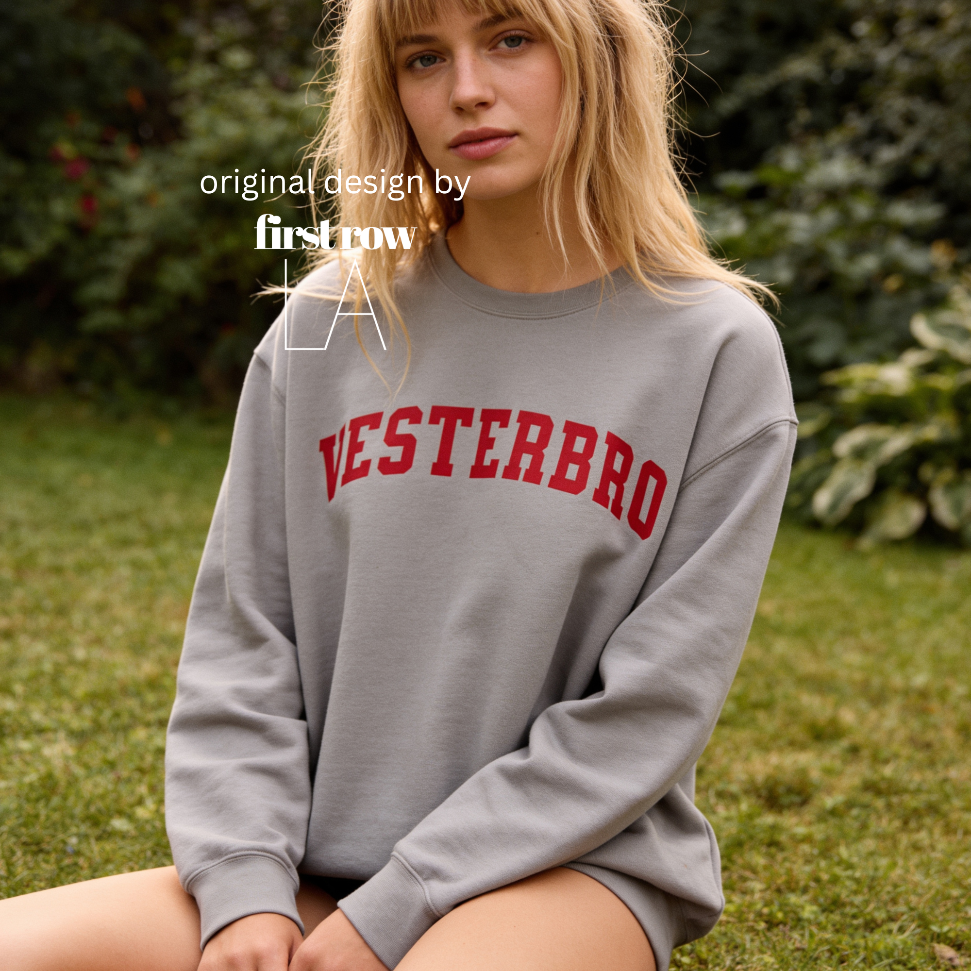 Woman wearing a crewneck sweatshirt with 'VESTERBRO' printed in dark red collegiate letters across the chest.

Original design and copyright by first row LA.