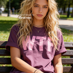 A woman wearing a berry oversized T-shirt with large pink 'WTF' print.

Original design and copyright by first row LA 2026.